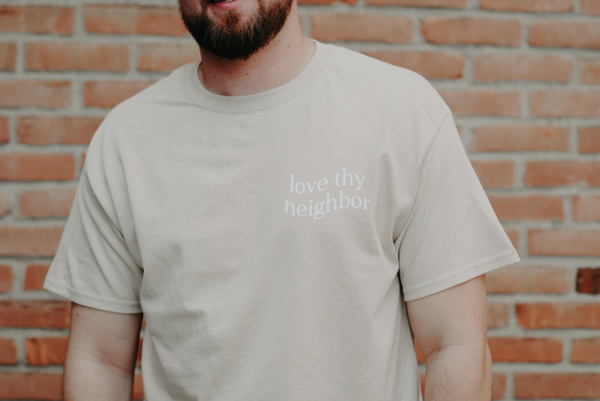 Love Thy Neighbor Premium T-Shirt - Sand - Christian Bracelets and Apparel - In His Name Company Products
